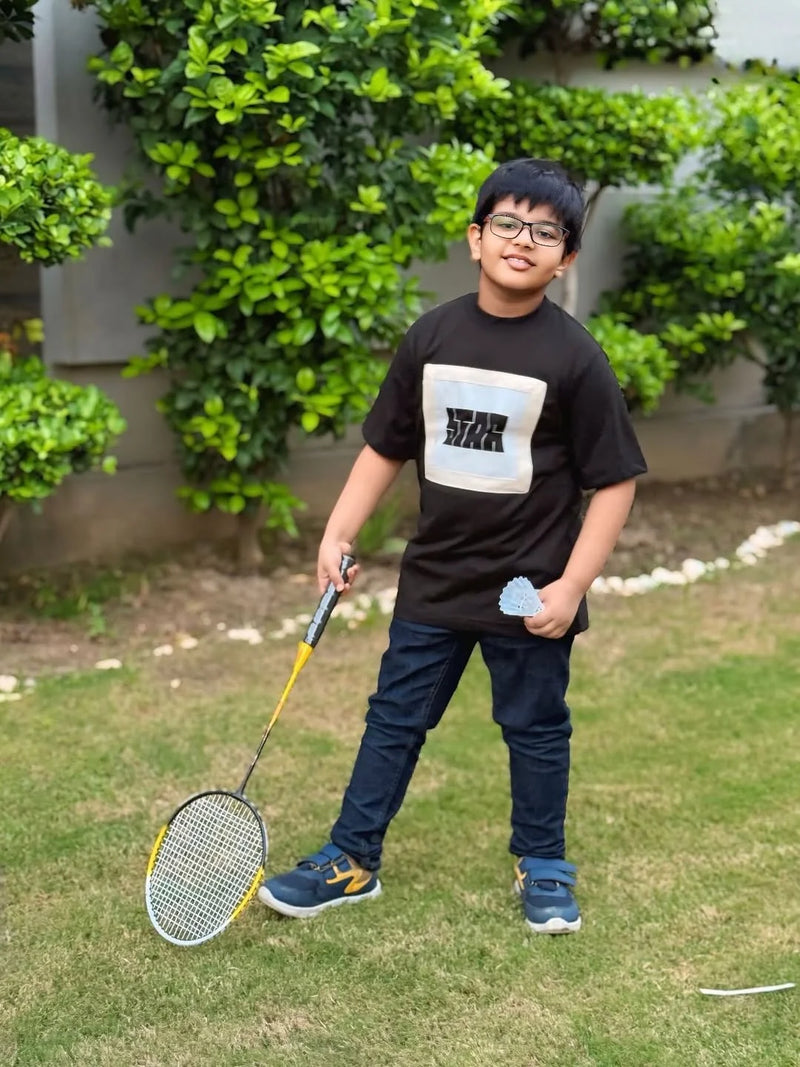 Kid wearing Mama Doura tee