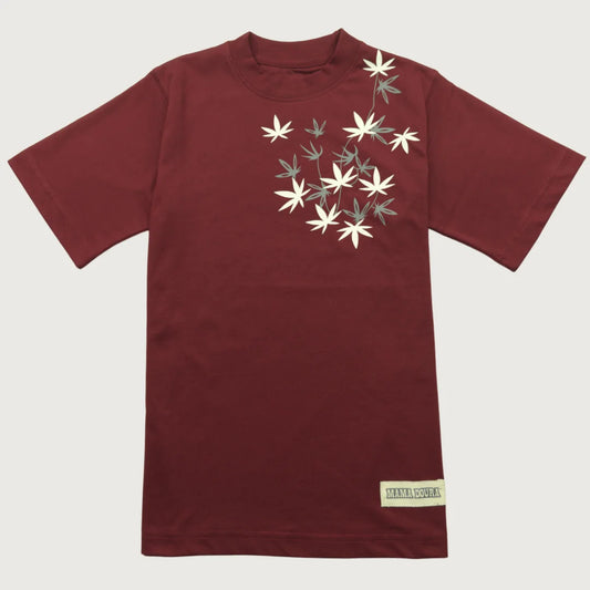 Crimson t-shirt with white floral design on a light gray background